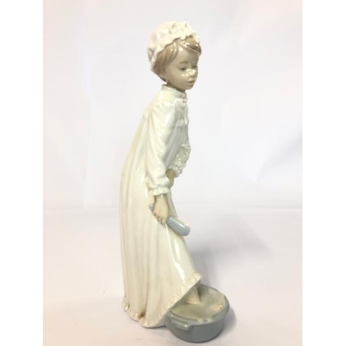 24 - Two Lladro Nao figurines 