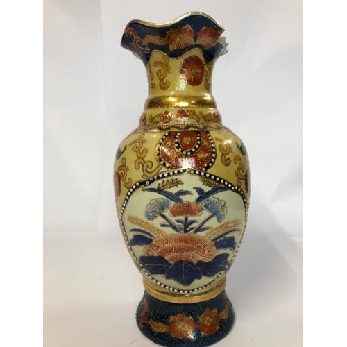 29 - Six assorted vases including a large floor vase decorated with peacocks, 55cm high and a pair of blu... 