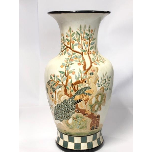 29 - Six assorted vases including a large floor vase decorated with peacocks, 55cm high and a pair of blu... 