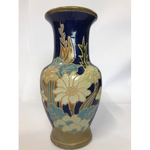 29 - Six assorted vases including a large floor vase decorated with peacocks, 55cm high and a pair of blu... 