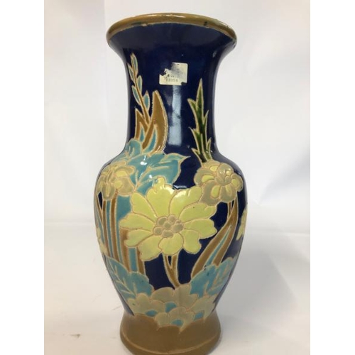 29 - Six assorted vases including a large floor vase decorated with peacocks, 55cm high and a pair of blu... 