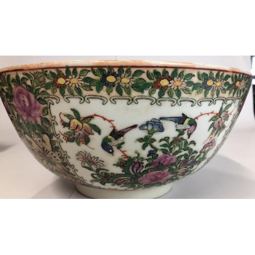 4 - A large early 20th centaury Chinese famille rose bowl decorated with a village scene, six character ... 