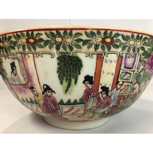 4 - A large early 20th centaury Chinese famille rose bowl decorated with a village scene, six character ... 