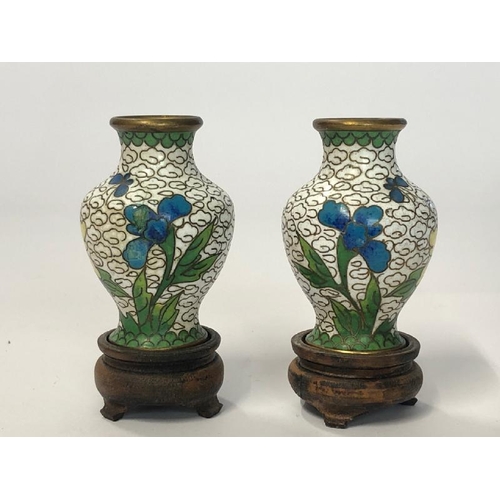 8 - A pair of vintage miniature cloisonne vases (5cm high) on wooden bases with a matching round trinket... 