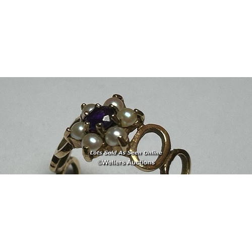 160 - Amethyst and split pearl cluster ring in 9ct hallmarked gold, with pierced shoulder decoration. Ring... 