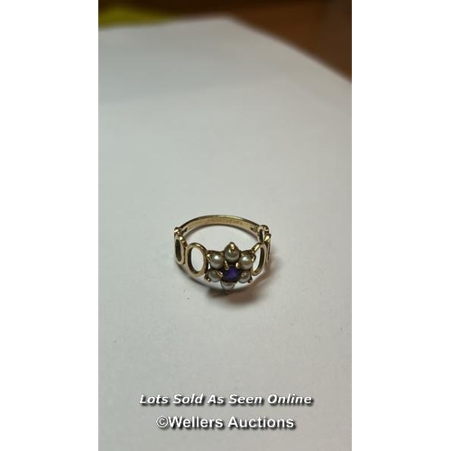 160 - Amethyst and split pearl cluster ring in 9ct hallmarked gold, with pierced shoulder decoration. Ring... 