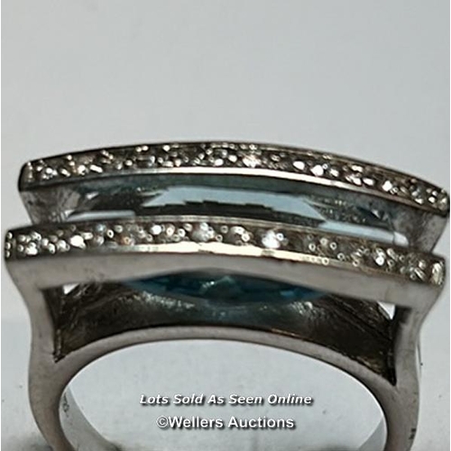 168 - Two rings stamped 925 for silver, one set with blue and white cubic zirconia, ring size N, the other... 