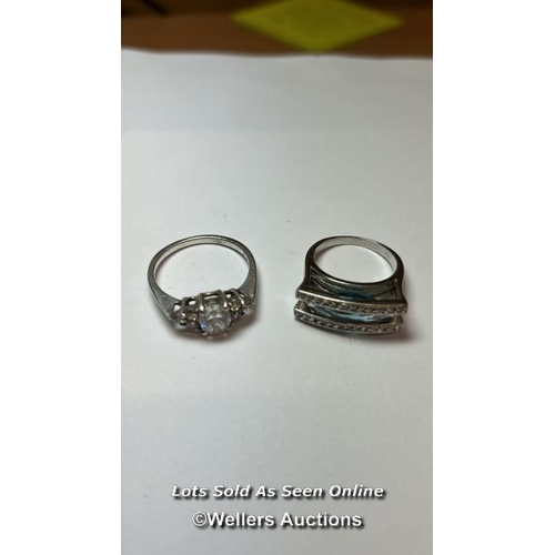 168 - Two rings stamped 925 for silver, one set with blue and white cubic zirconia, ring size N, the other... 