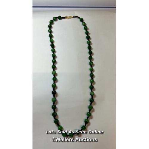 178 - Jade bead necklace string knotted in contrast thread with gold plated hook clasp. Length 60cm, 8-8