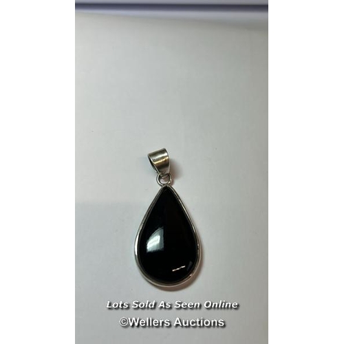 183 - Black onyx pear drop pendant in metal stamped 925 for silver. Length 5cm / SF