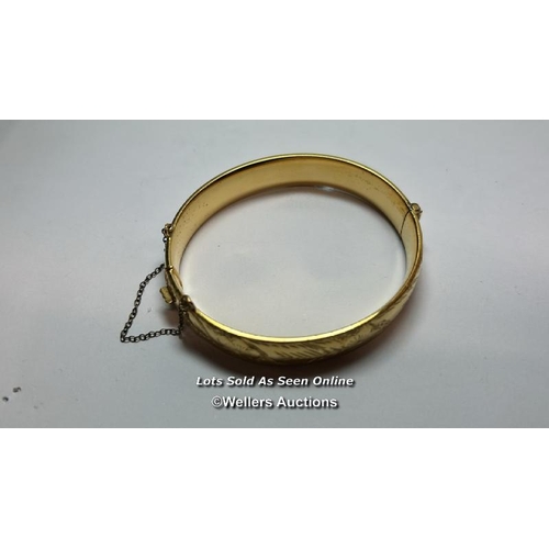 200 - Rolled gold bangle with Excaliber box / SF