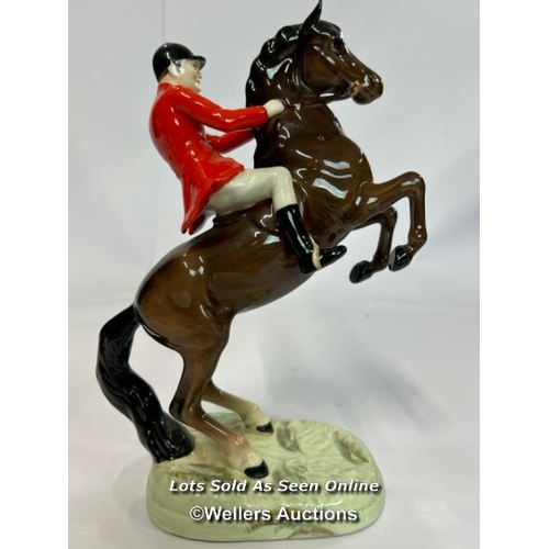 49 - Rare Beswick 'Huntsman On Rearing Horse' No. 868, 25cm high, damage to one of the horses ears / AN9