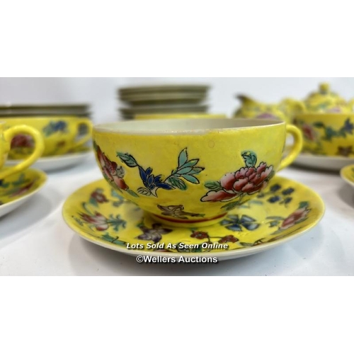 62 - Vintage Chinese fourty five piece tea service, hand painted yellow with flowers / AN13