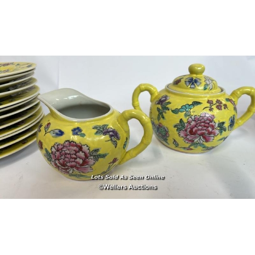 62 - Vintage Chinese fourty five piece tea service, hand painted yellow with flowers / AN13