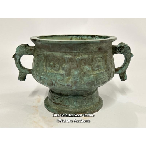 64 - Early middle eastern bronze two handled censor, 8.5cm high, 10cm diameter / AN13