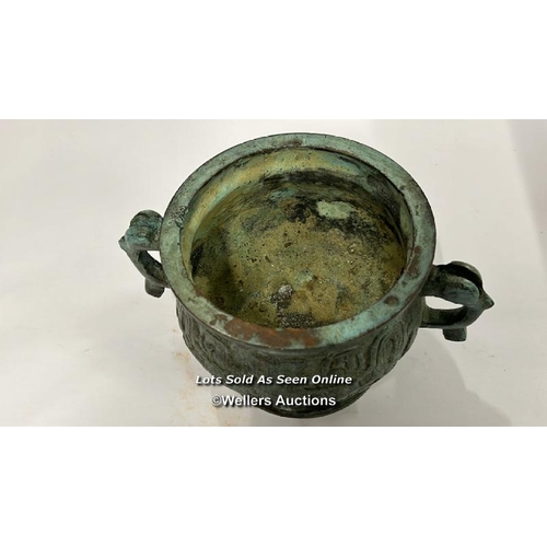 64 - Early middle eastern bronze two handled censor, 8.5cm high, 10cm diameter / AN13