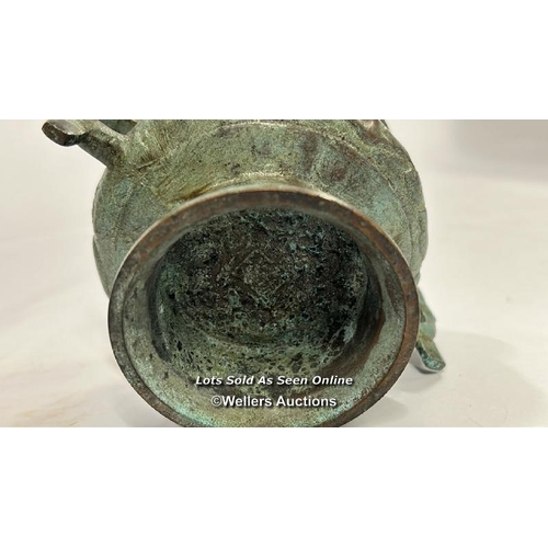 64 - Early middle eastern bronze two handled censor, 8.5cm high, 10cm diameter / AN13