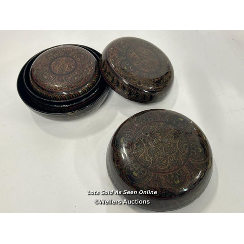 70 - A decorative lacquer ware set of three round boxes, largest 15cm diameter  / AN14