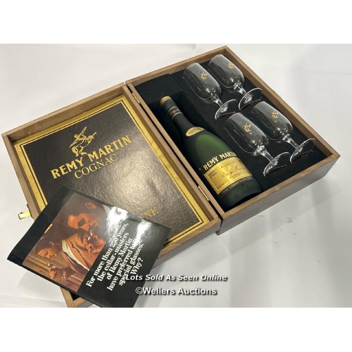 77 - Remy Martin cognac gift set including four glasses, 68cl, 40%Vol, unopened but some evaporation evid... 