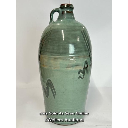 81 - Large glazed pottery jug with hole for a tap, 52cm high / AN21