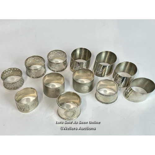 99 - Twelve assorted napkin rings including five hallmarked silver, silver weight 161g / AN17