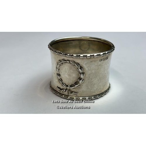 99 - Twelve assorted napkin rings including five hallmarked silver, silver weight 161g / AN17