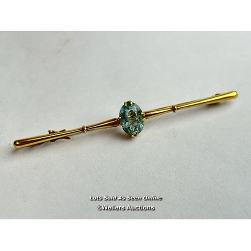 203 - A boxed 15ct gold bar brooch set with a single aquamarine, 6cm wide / SF