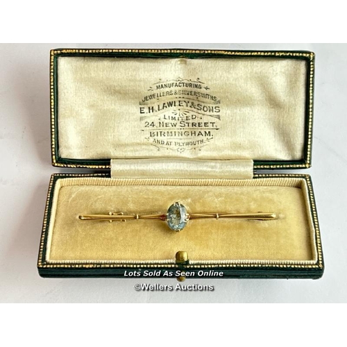 203 - A boxed 15ct gold bar brooch set with a single aquamarine, 6cm wide / SF