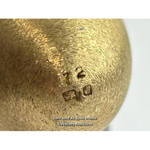 208 - A hallmarked silver gilt egg Stuart Devlin, London 1973, nursery rhyme collection.Opening to reveal ... 