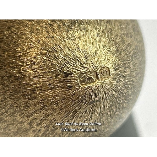 209 - A hallmarked silver gilt egg Stuart Devlin, London 1973, nursery rhyme collection. Opening to reveal... 