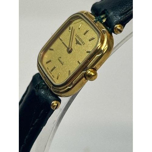 219 - Vintage Longines gold plated wristwatch no.21712443 with quartz movement on black leather strap / SF