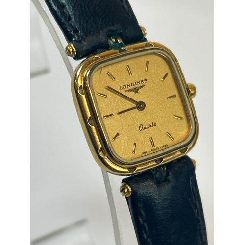 219 - Vintage Longines gold plated wristwatch no.21712443 with quartz movement on black leather strap / SF