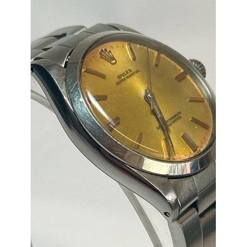 220 - Gents vintage 1965 Rolex Oyster, perpetual superlature chronometer watch with champagne dial and bat... 