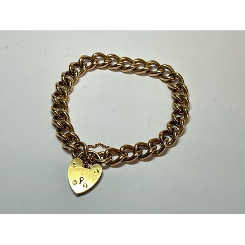 223 - 9ct hallmarked gold solid curls link bracelet with heart shaped padlock, clasp and safety chain. Len... 