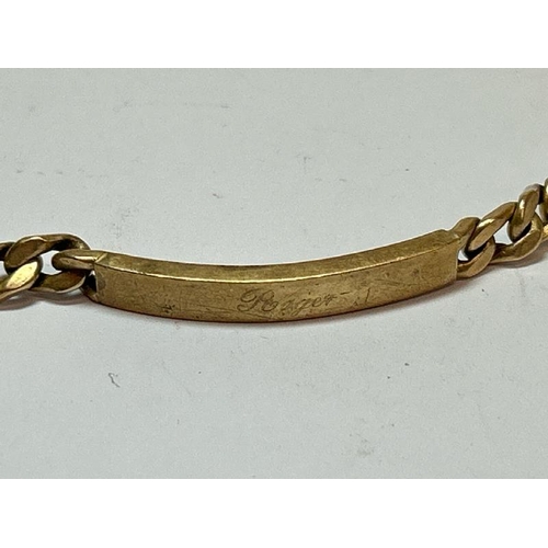 224 - 9ct hallmarked gold hollow curl link identity bracelet, engraved 'Roger Love from Pauline 13-6-89'. ... 