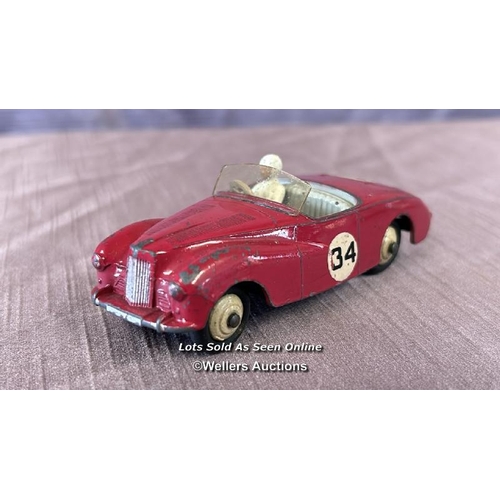 107 - THREE DINKY DIE CAST RACING CARS INCLUDING SUNBEAM ALPINE NO. 107, AUSTIN HEALEY NO. 109 AND ASTON M... 