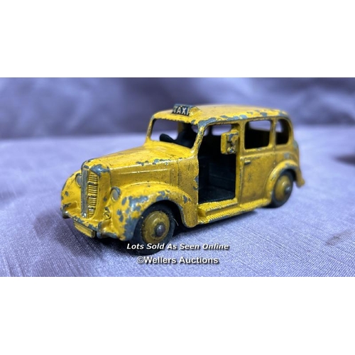 119 - THREE DIE CAST CARS INCLUDING DINKY FORD ZEPHYR NO. 162, DINKY AUSTIN TAXI AND WOLSELEY 60-80