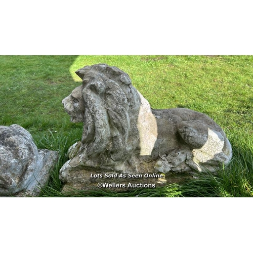 143 - PAIR OF COMPOSITION RECUMBENT LION STATUES, WEATHERED, 70 X 30 X 50CM,