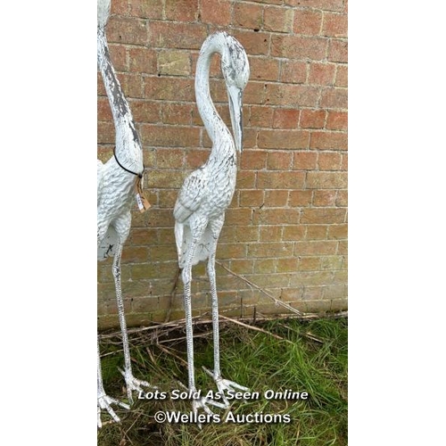 144 - 20TH CENTURY WHITE PAINTED BRONZE HERONS