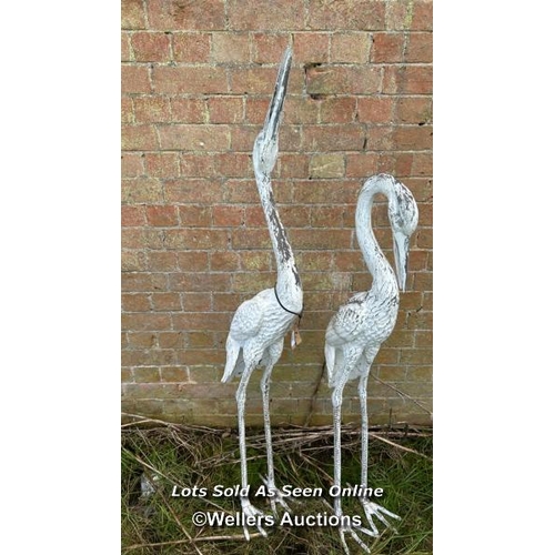 144 - 20TH CENTURY WHITE PAINTED BRONZE HERONS