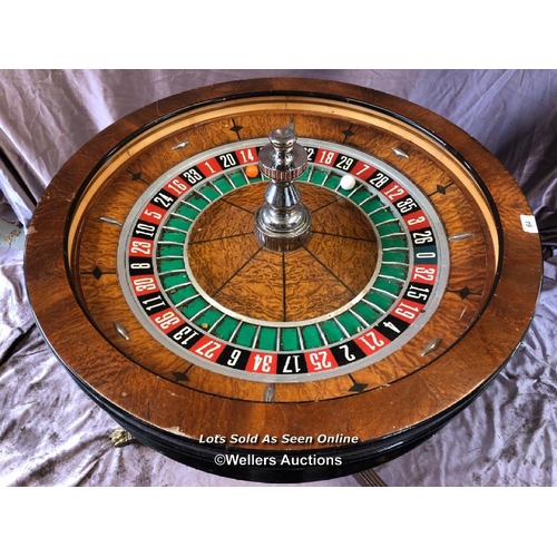 64 - 20TH CENTURY LARGE WALNUT ROULETTE TABLE, DIAMETER 80CM