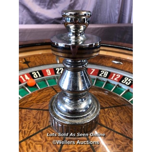 64 - 20TH CENTURY LARGE WALNUT ROULETTE TABLE, DIAMETER 80CM