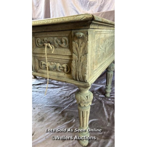 65 - DECORATIVE BLEACHED OAK DESK WITH FOUR DRAWERS ON CARVED LEGS, 130 X 76 X 74.5CM