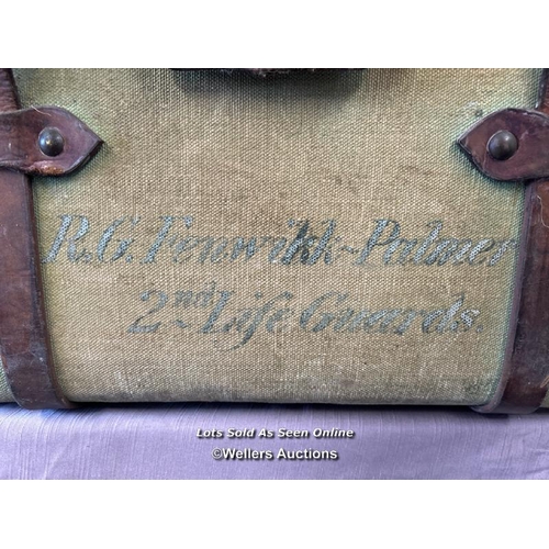 75 - VINTAGE CANVAS MILITARY TRUNK WITH LEATHER MOUNTS AND STRAPS, PREVIOUSLY OWNED BY R G FENWICK-PALMER... 