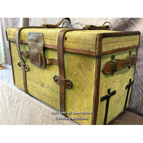 75 - VINTAGE CANVAS MILITARY TRUNK WITH LEATHER MOUNTS AND STRAPS, PREVIOUSLY OWNED BY R G FENWICK-PALMER... 