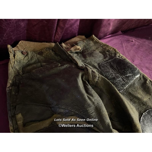 452 - EARLY PILOTS OR MOTORCYCLE TROUSERS IN RELIC CONDITION, EXTREMELY WELL WORN, DISPLAY ONLY