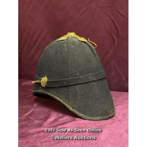 479 - A HOME SERVICE PATTERNED HELMET, PROBABLY THEATRICAL USE