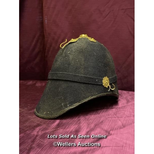 479 - A HOME SERVICE PATTERNED HELMET, PROBABLY THEATRICAL USE