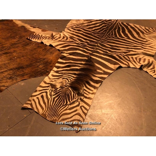 545 - CIRCA 1930 GREVY'S BROWN AND WHITE ZEBRA SKIN RUG, 256 X 170CM