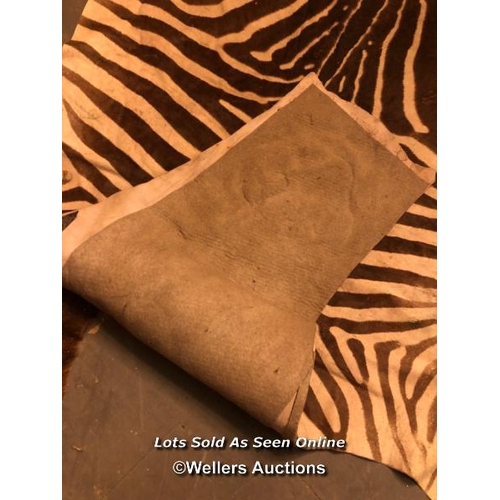 545 - CIRCA 1930 GREVY'S BROWN AND WHITE ZEBRA SKIN RUG, 256 X 170CM